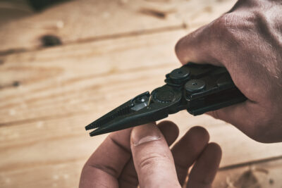 LVIV, UKRAINE - December 21, 2023:: Multitool Leatherman Wave Plus black